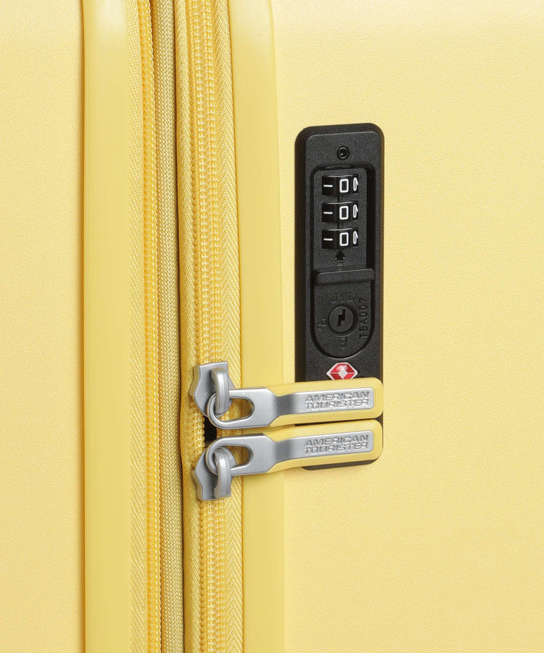 American Tourister Dynabelt Spinner (4 wheels) sunny yellow