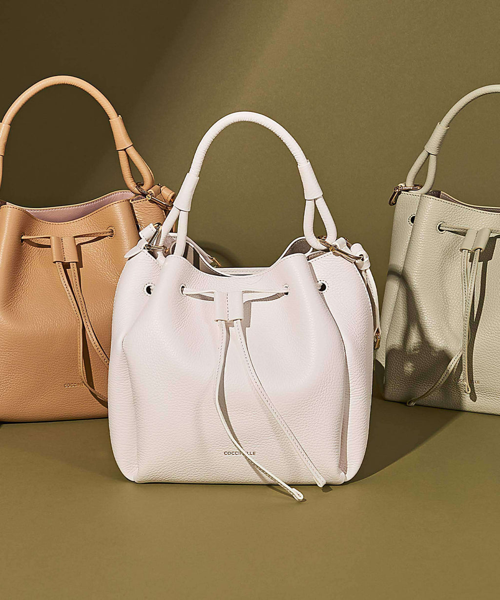 Coccinelle Eclyps Bucket bag brillant white